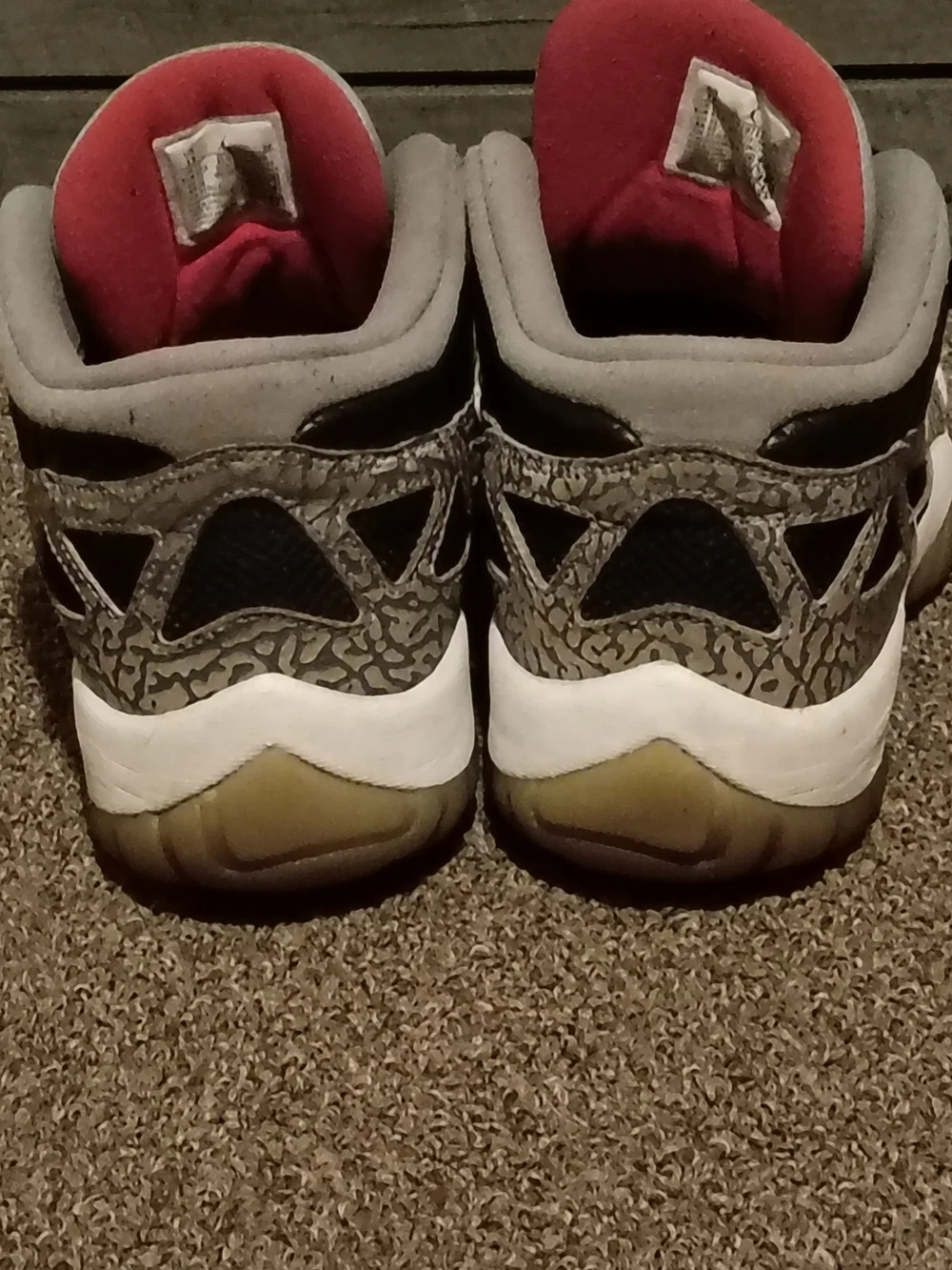 Jordan 11 Retro Low IE sneakers in Black, White and Red